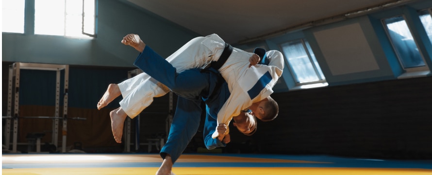 two-young-judo-fighters-in-kimono-training-martial-2023-11-27-05-30-59-utc